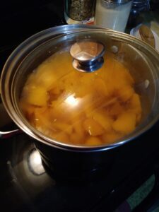 Mango Madness Time - Coffee with Candis Carmichael - stock pot full of mangos